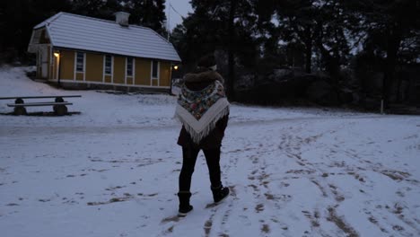 woman walking in the snow