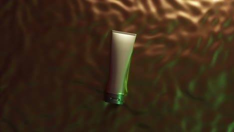 luxury cosmetic tube mockup on green and gold fabric