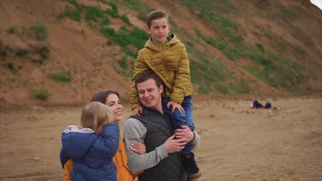 family enjoying a day at the beach