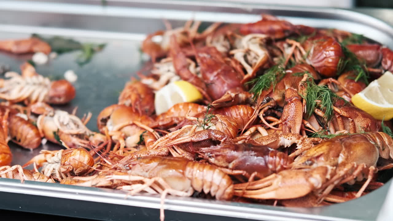 Plateau with cooked crayfish. Food festival