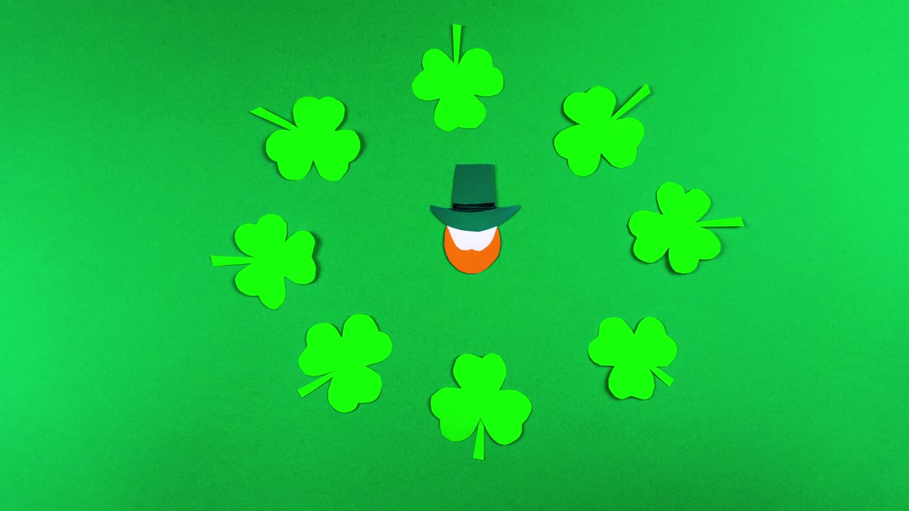 4k Greeting card for St. Patrick's Day, which is celebrated on March 17. Irish cultural holiday. Symbols of feast a shamrocks and leprechauns. Green background.