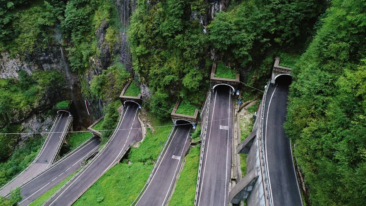 San Boldo Pass, steep tunnel road winds through dramatic cliffs, Northern Italy