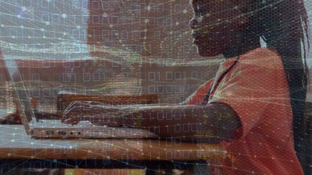 Animation of digital wave and binary coding over african american boy using laptop at school