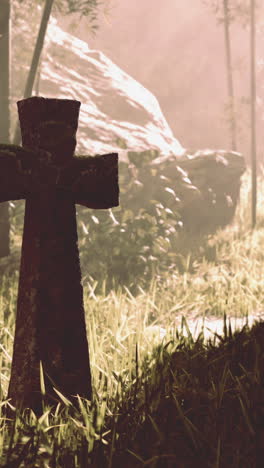 stone cross in a forest