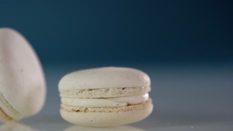 one macaroon falls on top of another macaroon in slow motion