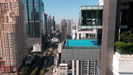 drones fly over the buildings and business districts in bangkok