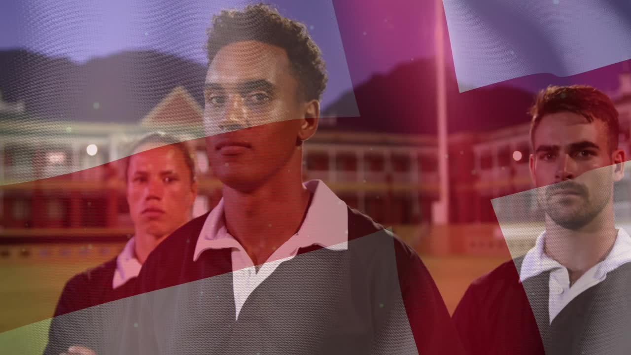 Animation of flag of england over diverse male rugby players at pitch