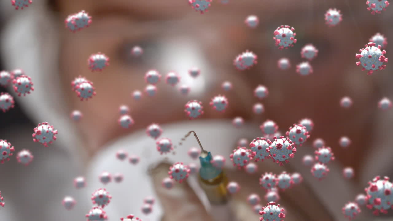 코로나19 세포는 주사기를 들고 있는 의사에게 움직입니다.