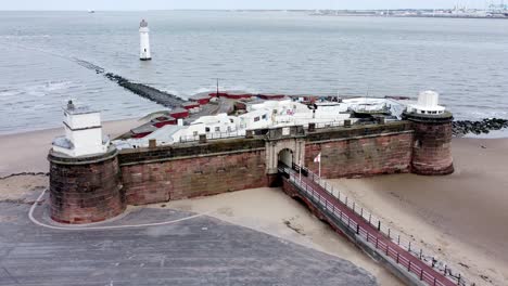 fort perch rock new brighton sandstone coastal defence battery museum and lighthouse aerial view right to peel port