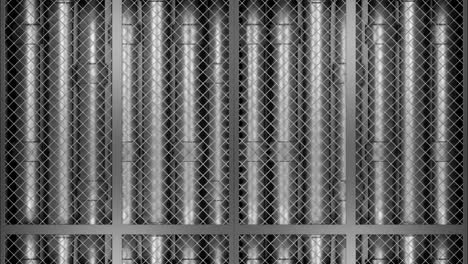 close-up of a metal grid with pipes behind it