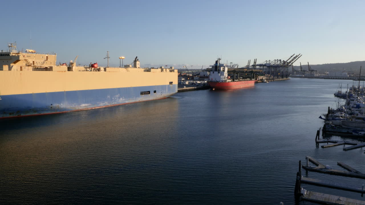 Large Ships Docked in a Busy Industrial Harbor