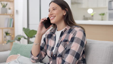 Woman,-smile-and-phone-call-in-home-on-smartphone