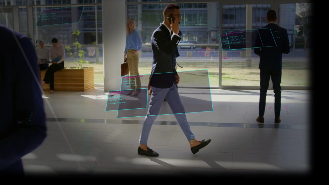 Businessman entering atrium and walking, AR business panels tracking torso while checking phone