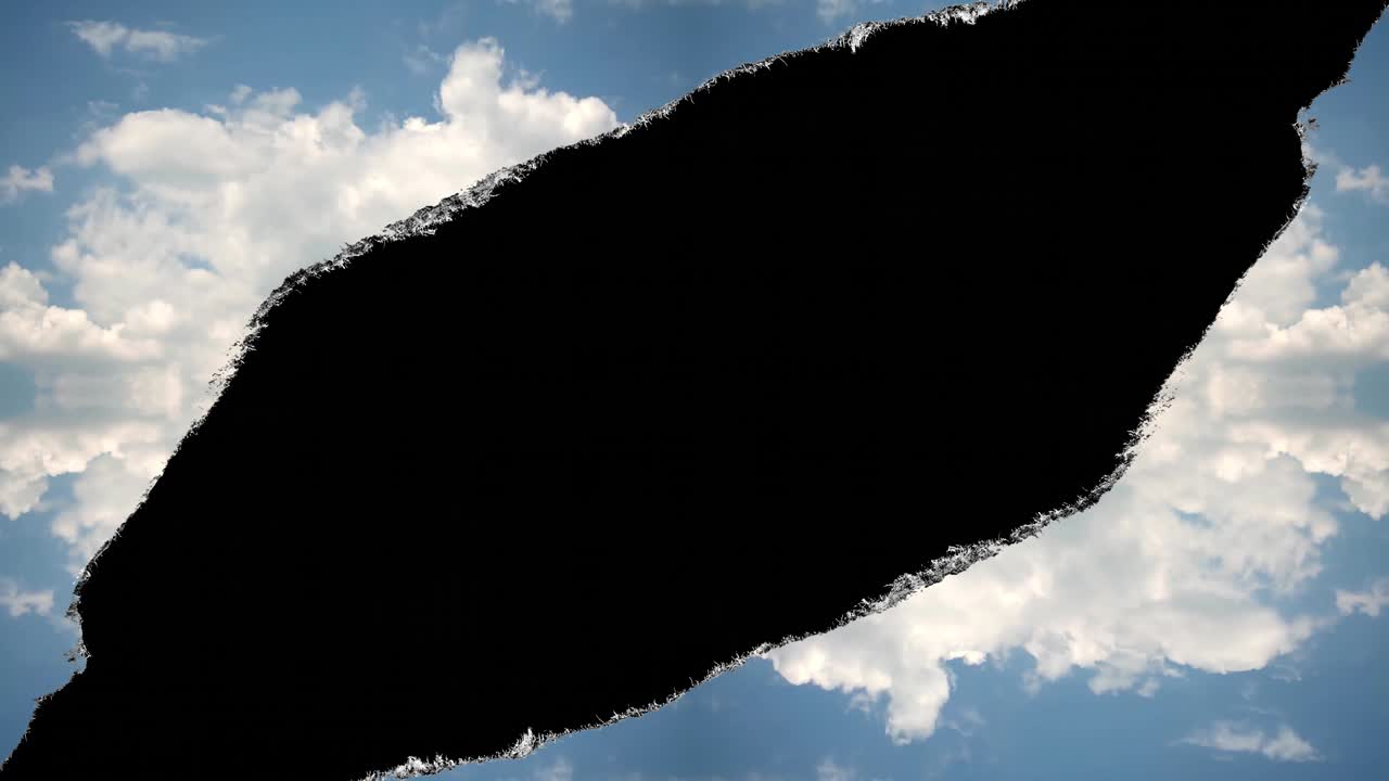 Creative 4k time laps video of a hole in the sky with moving clouds with torn edges like on paper with a black center isolated. The conceptual idea of a hole in space.