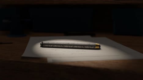 3d animation of an old fashioned pen on top of a wooden table