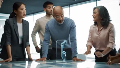business team discussing technology in modern office