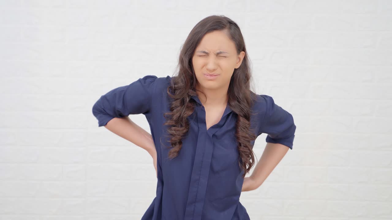 Indian girl having back pain