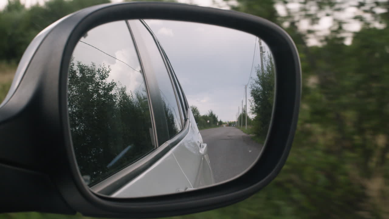 Reflection in a car mirror