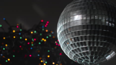 rotating discoball and twinkling lights