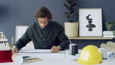 a handsome young male architect working