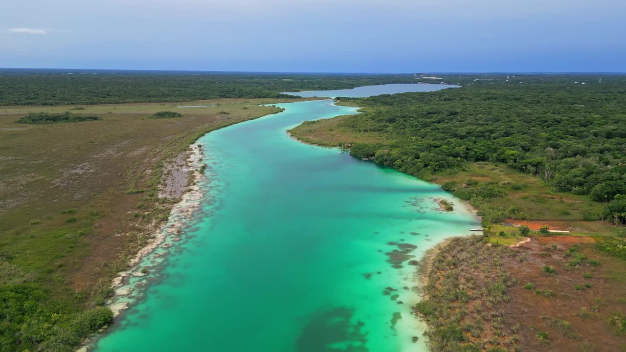 Aerial view of Bacalar lagoon in Mexico with vibrant blue waters