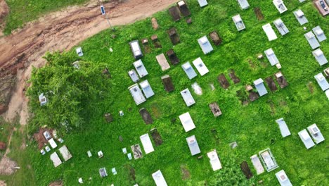 Aerial-view-over-a-cemetery-in-Africa,-Forward-flyby