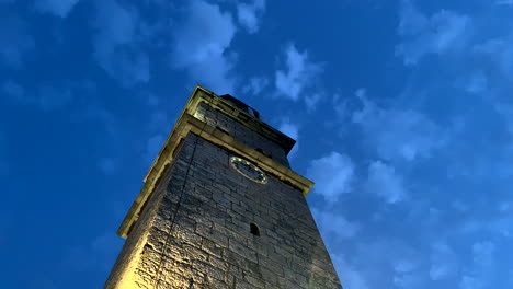 view from the bottom up on the church of premantura croatia at evening dusk