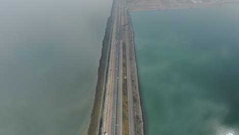 a breakwater road that separates the sea