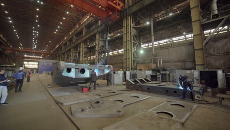 industrial welding and manufacturing process in a factory