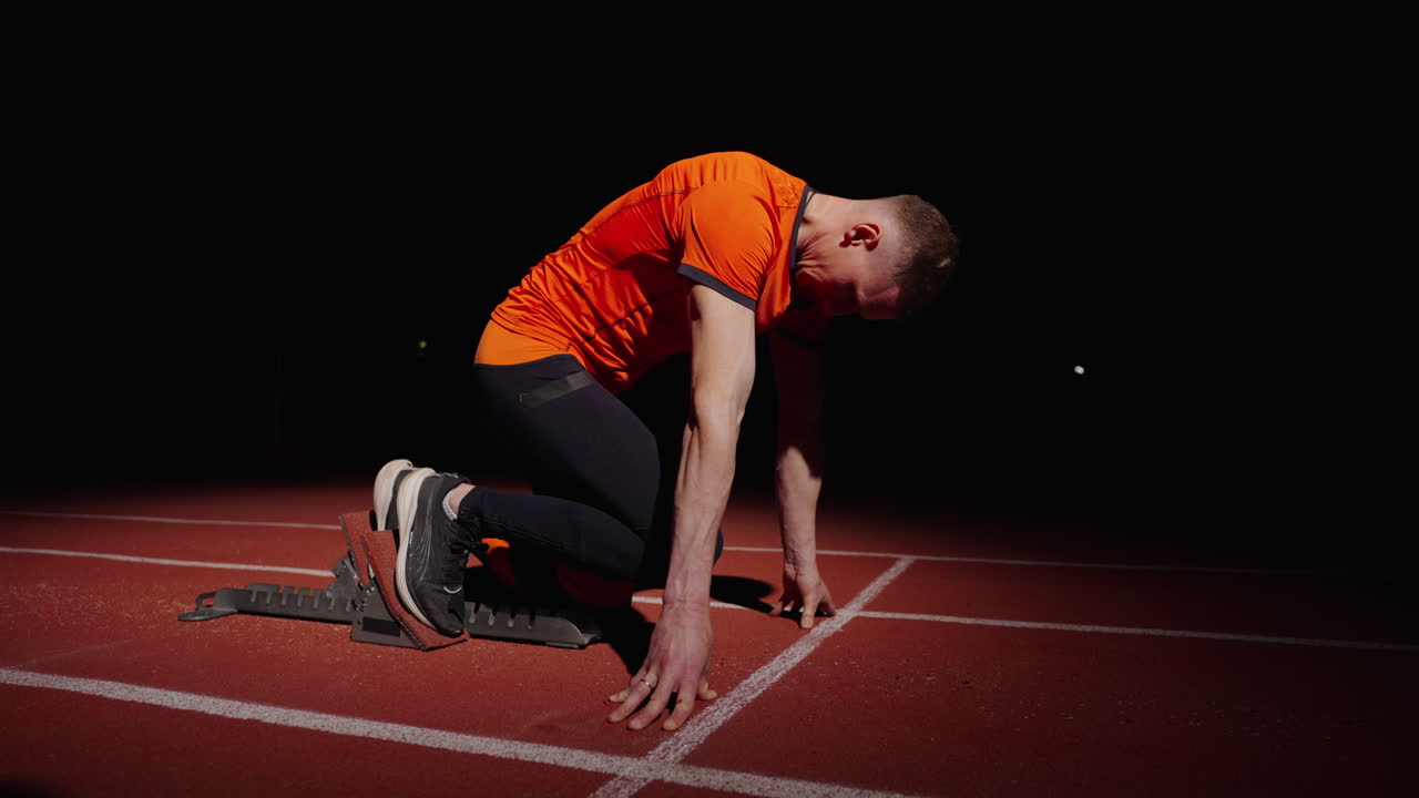 스프린트 를 준비 하는 운동 선수