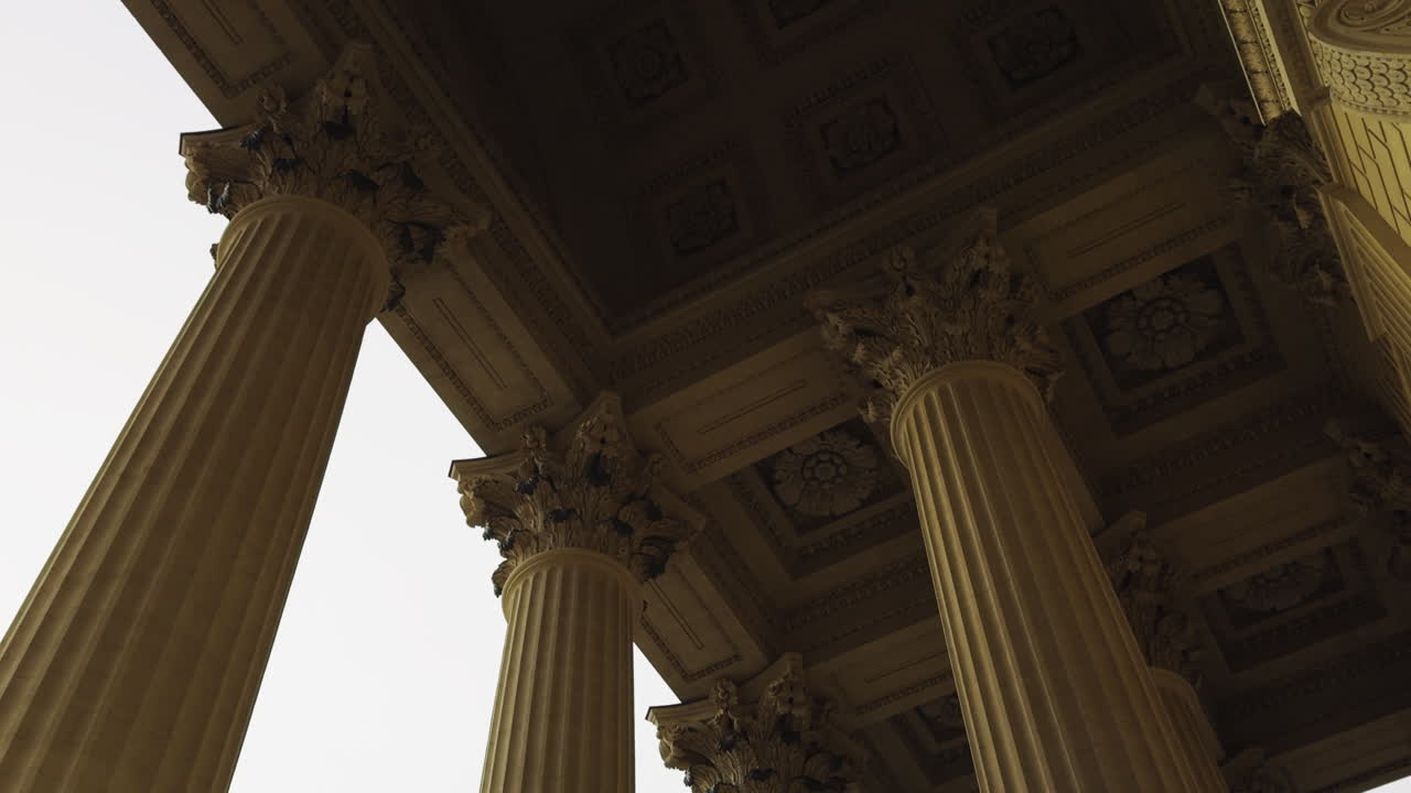 Majestic Corinthian columns of La Madeleine from low-angle perspective, Paris, France