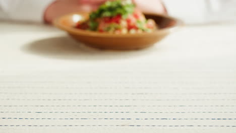 tabbouleh salad being held