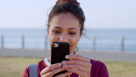 Woman,-phone-and-smile-on-beach-for-comic-social