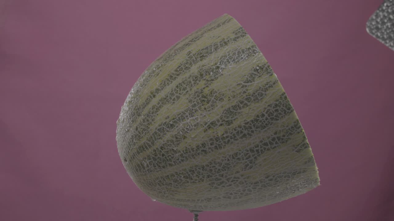 мелон вращается с петлей на экране фуксии для хроматического ключа