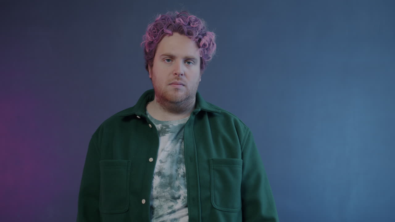 Man with Pink Hair in Different Gestures