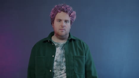 man with pink hair in different gestures