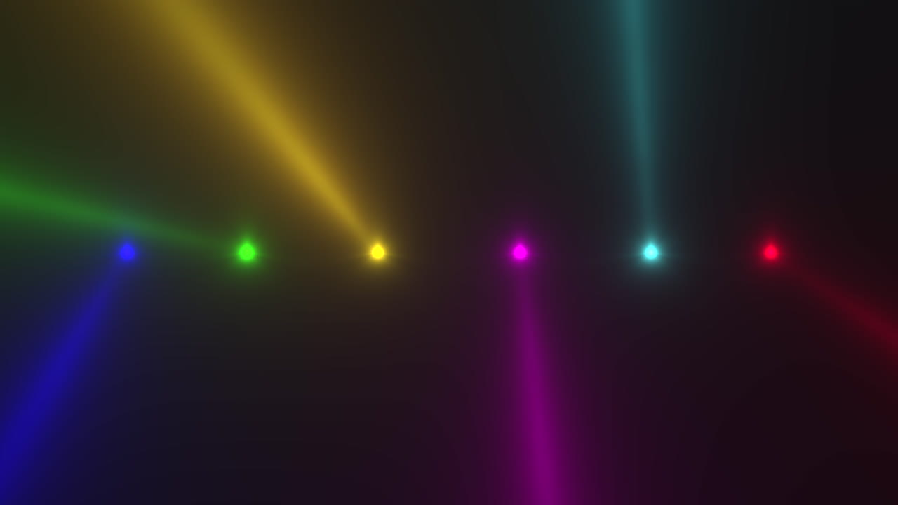 Animation motion colorful glowing spotlight beams on dark background in stage