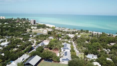 sobrevuelo lento de siesta key florida hacia el agua turquesa del golfo