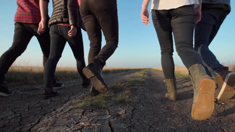 friends walking on a country road
