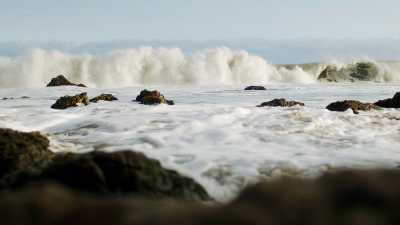 Powerful Ocean Waves Crashing on a Rocky Shore