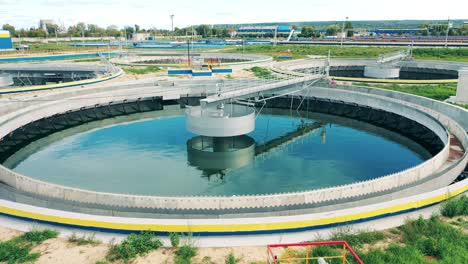 modern round wastewater cleaning reservoirs at a sewage treatment facility