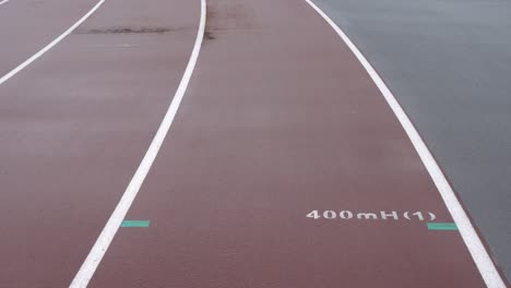 athletics track in the stadium. the ground marks 400mh(1).