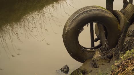 4k close up on the use of old tires as fender for boats to dock in the ria de aveiro in the estuary of the river vouga