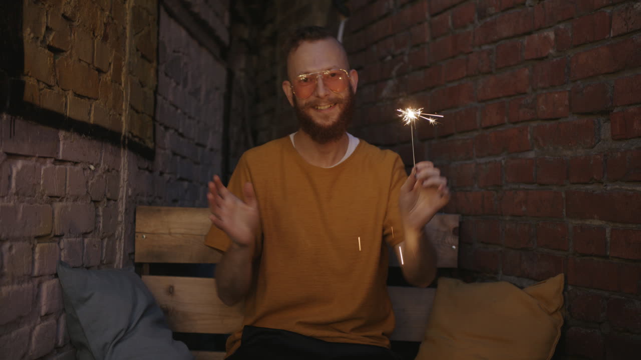 Man with Sparkler in Urban Interior