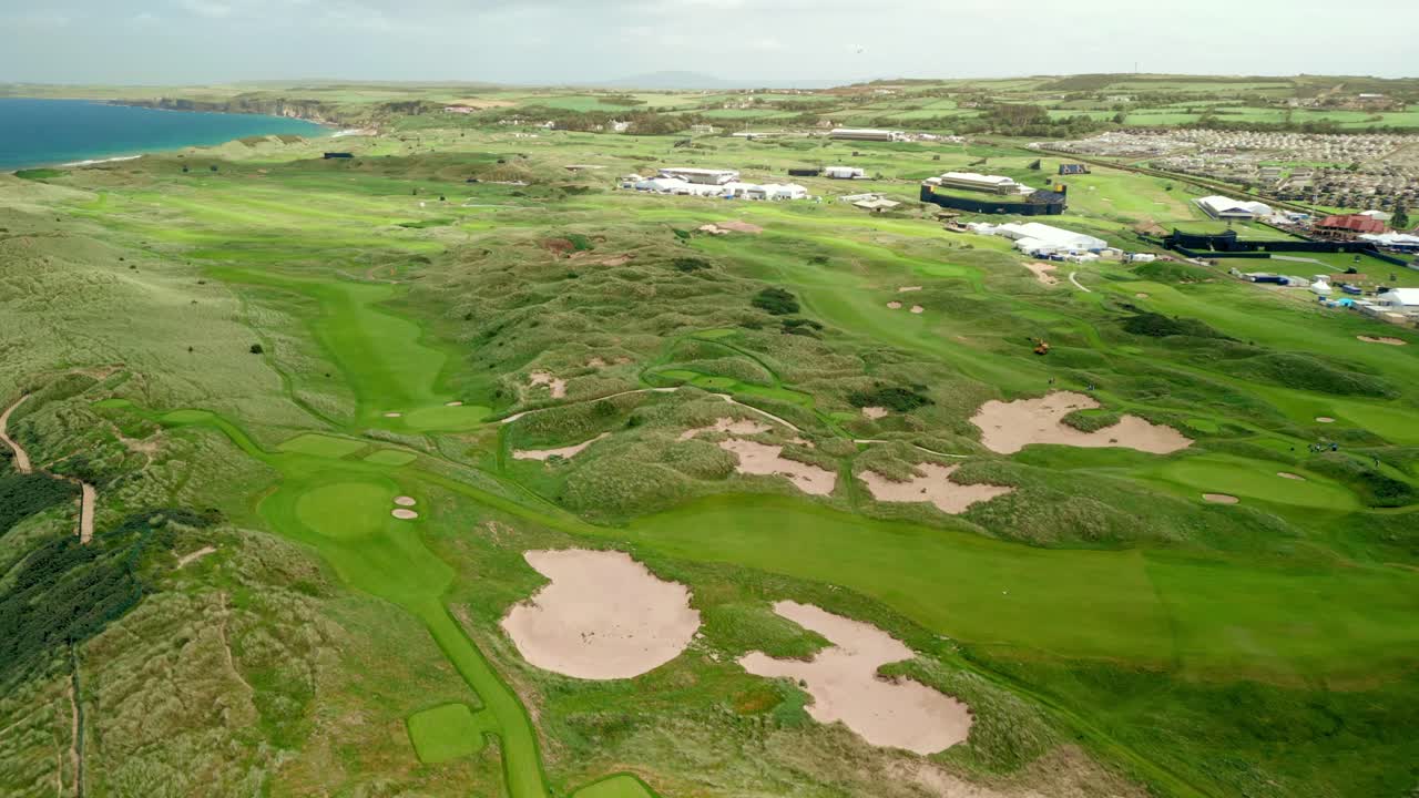 Wide reversing 4K aerial video of Royal Portrush Golf Club in Northern Ireland, UK. Filmed in 60 frames per second and with Rec709 color.