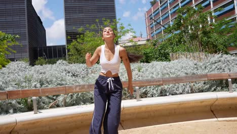 woman dancing in urban park