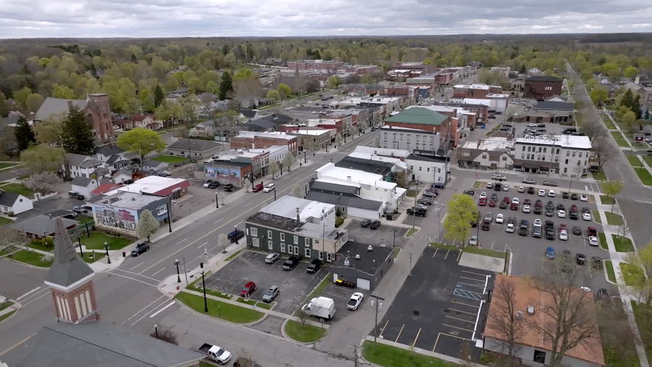 Downtown Marshall, Michigan with drone video moving down at an angle