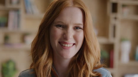 portrait pretty young woman laughing happy red head female enjoying satisfaction looking at camera slow motion