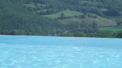 luxurious infinity pool on the hillside of resort in umbertide, perugia, italy, south europe