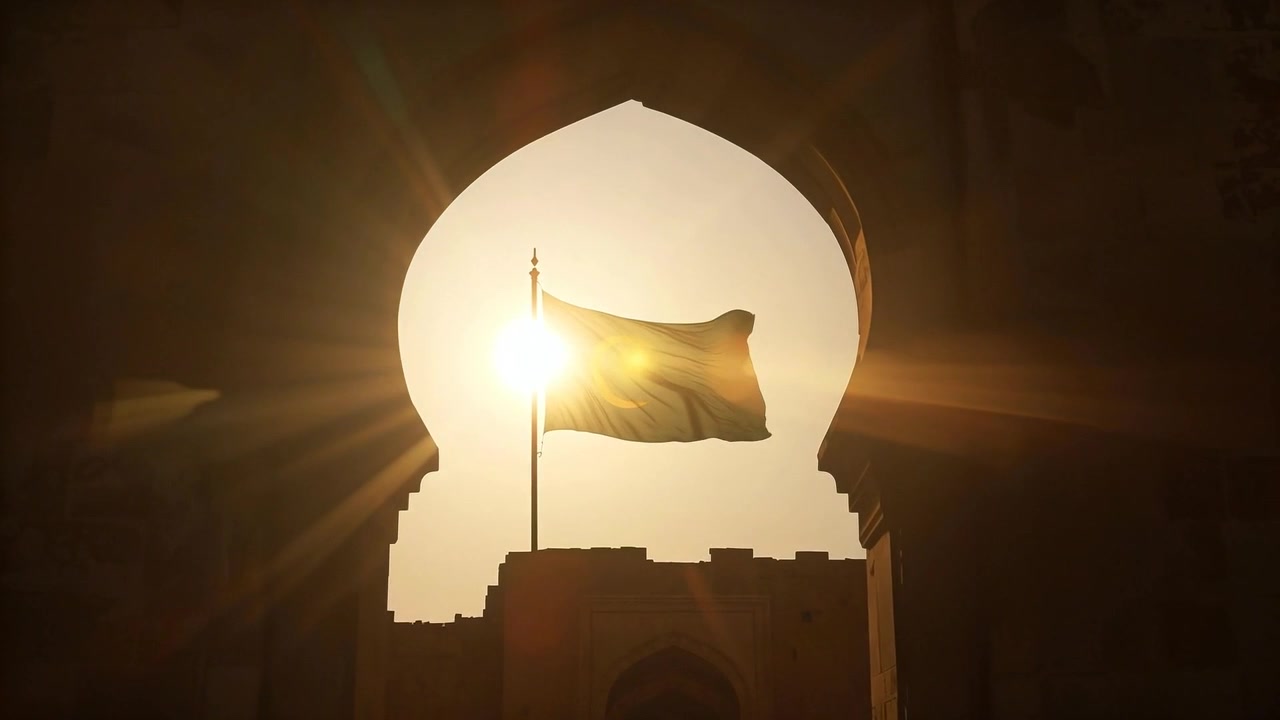 Drifting sun casting starburst flare behind flagpole through scalloped arch flag rippling in breeze
